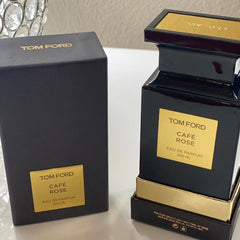 Tom Ford Cafe Rose perfume bottle and packaging on a white surface
Café Rose Eau de Parfum by Tom Ford is a seductive exploration of rose layered with exotic spices, dark coffee, and sensual woods. It’s luxurious, deep, and unforgettable crafted for the confident woman who loves to make a statement. This 100% authentic imported tester offers designer quality without the designer price tag.