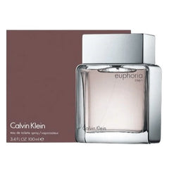 A bottle of Calvin Klein Euphoria Men Eau de Toilette with a clear, pink-colored liquid inside. The packaging is primarily gray and pink, with the brand's logo visible.
Calvin Klein Euphoria Men Eau de Toilette is a bold and magnetic scent crafted for the modern man. With its spicy freshness, herbal heart, and warm woody base, this 100% authentic imported tester captures both strength and elegance perfect for day-to-night wear, all at an irresistible value.