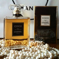 Chanel perfume bottle and packaging with pearls on a white background
Chanel Coco Eau de Parfum is a tribute to timeless femininity _a deep, floral-oriental scent laced with romantic rose, seductive spices, and warm amber. It’s crafted for the confident woman who embraces her inner strength and desires a luxurious signature scent that lingers. This 100% authentic imported tester delivers iconic Chanel sophistication minus the luxury price tag.