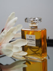 Chanel N°5 Eau de Parfum is an iconic floral-aldehyde fragrance, known for its refined, timeless composition. With a perfect blend of fresh citrus, delicate florals, and warm woody notes, this perfume embodies luxury and sophistication like no other.
