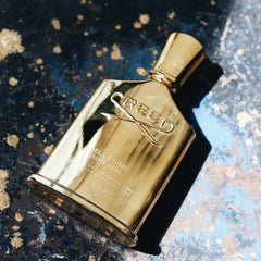 Gold Creed perfume bottle on a decorative surface
Creed Millesime Imperial is a masterpiece of refinement, crafted for men and women who desire elegance, freshness, and luxury in every spray. Inspired by the romance of the Mediterranean, this 100% authentic imported tester combines salty sea accords, citrus brightness, and warm musky woods all with Creed’s signature artistry, without the premium price tag.