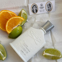 Fragrance bottle with orange and lime slices on a textured surface
Creed Silver Mountain Water Eau de Parfum is a vibrant blend inspired by the sparkling mountain landscapes of the Swiss Alps. Cool, refreshing, and quietly luxurious, it’s made for those who seek uniqueness, elegance, and confidence in every spray. This 100% authentic imported white box tester offers the full Creed experience without the boutique price tag.