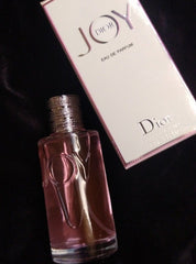 Dior JOY perfume bottle and packaging on a dark background
https://www.pinterest.com/pin/793689134355911327/