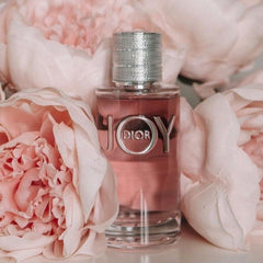 Dior perfume bottle with pink flowers in the background
Dior Joy Eau de Parfum is a luminous and vibrant scent that celebrates the simple pleasure of life. With a delicate harmony of citrus, florals, and musks, it’s crafted for the modern woman who radiates happiness and grace. This 100% authentic imported tester brings you Dior’s exceptional quality at unbeatable price.