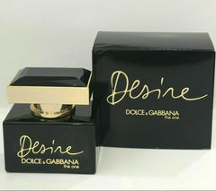Dolce & Gabbana Desire perfume bottle and packaging on a white background
Dolce & Gabbana The One Desire Eau de Parfum is a tribute to the empowered woman who lives boldly and unapologetically. Enriched with warm gourmand tones and soft florals, this luxurious scent is seductive and captivating from the very first spritz. Our 100% original imported tester brings all the richness of D&G quality without the luxury price.