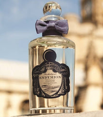 Perfume bottle with a bow tie on a blurred architectural background
Endymion Eau De Cologne by Penhaligon’s is an intoxicating blend of spice, citrus, and sensual woods crafted for the gentleman who appreciates depth, mystery, and understated luxury. This 100% authentic imported tester delivers British elegance and rich olfactory layers at an unbeatable value.