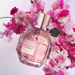 Flowerbomb Eau de Parfum by Viktor & Rolf is a dazzling floral explosion that blends sensuality with sophistication. From its sparkling top notes of Tea, Bergamot, and Osmanthus, to its lush floral heart of Orchid, Jasmine, Freesia, Rose, and African Orange Flower, this fragrance is both romantic and radiant. The rich base of Patchouli, Musk, and Vanilla wraps it all together with warmth and depth. This 100% authentic imported tester brings you the same luxurious scent and performance as the retail