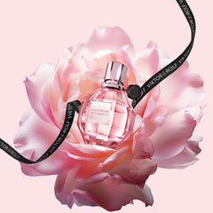 Flowerbomb Eau de Parfum by Viktor & Rolf is a dazzling floral explosion that blends sensuality with sophistication. From its sparkling top notes of Tea, Bergamot, and Osmanthus, to its lush floral heart of Orchid, Jasmine, Freesia, Rose, and African Orange Flower, this fragrance is both romantic and radiant. The rich base of Patchouli, Musk, and Vanilla wraps it all together with warmth and depth. This 100% authentic imported tester brings you the same luxurious scent and performance as the retail