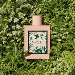 Gucci Bloom perfume bottle surrounded by green plants and flowers
Gucci Bloom Acqua di Fiori Eau de Toilette is a vibrant twist on the classic Bloom, blending green galbanum and sparkling citrus with delicate white florals. It’s a fragrance that evokes springtime, spontaneity, and feminine vitality. This 100% authentic imported tester brings luxury within reach, perfect for everyday elegance.