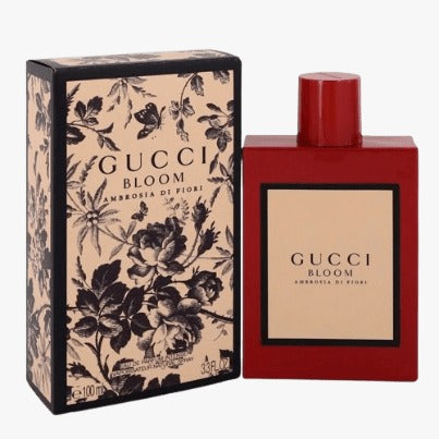 Gucci Bloom Ambrosia di Fiori EDP 100ml perfume bottle with box, featuring a floral design on the box and a red bottle of cologne.
Gucci Bloom Ambrosia di Fiori Eau de Parfum is a deeper, more luxurious interpretation of the original Bloom. This bold floral blends rare blossoms with elegant powdery undertones perfect for the confident woman who seeks a more intense, expressive signature scent. This 100% authentic imported tester delivers true Gucci quality at unbeatable price.