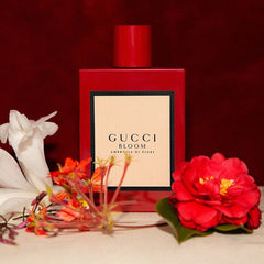 Gucci Bloom perfume bottle with flowers on a red background
Gucci Bloom Ambrosia di Fiori Eau de Parfum is a deeper, more luxurious interpretation of the original Bloom. This bold floral blends rare blossoms with elegant powdery undertones perfect for the confident woman who seeks a more intense, expressive signature scent. This 100% authentic imported tester delivers true Gucci quality at unbeatable price.