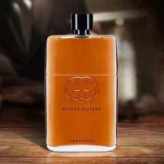 Orange Gucci Guilty Absolute perfume bottle on a wooden surface with blurred background
Gucci Guilty Absolute Pour Homme Eau de Parfum is a daring blend of leather and woods, crafted for the man who walks his own path. Deep, dry, and undeniably masculine, it offers a distinctive twist on classic notes. This 100% authentic imported tester delivers Gucci’s unmistakable luxury at a price that won’t hold you back.