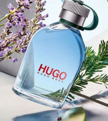 Hugo Boss perfume bottle with lavender and green leaves on a light background
Hugo Boss Man Eau de Toilette is a modern classic for the man who lives on his own terms. Fresh green apple, soothing lavender, and rugged woody notes come together to create a bold yet versatile scent that speaks of quiet confidence and ambition. This 100% authentic imported tester delivers signature Boss quality without the premium price tag.