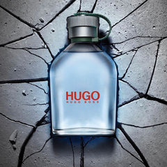 Hugo Boss perfume bottle on a cracked concrete background
Hugo Boss Man Eau de Toilette is a modern classic for the man who lives on his own terms. Fresh green apple, soothing lavender, and rugged woody notes come together to create a bold yet versatile scent that speaks of quiet confidence and ambition. This 100% authentic imported tester delivers signature Boss quality without the premium price tag.