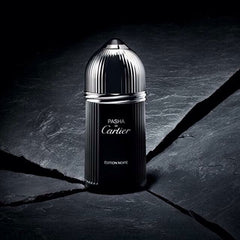 Cartier Pasha Edition Noire perfume bottle on a dark textured background
Pasha De Cartier Edition Noire Eau de Toilette is a contemporary take on the classic Pasha scent revitalized with fresh citrus, green notes, and aromatic spice. It’s made for the confident man who appreciates both timeless tradition and sleek modernity. This 100% authentic imported tester offers the full Cartier experience without the luxury price tag.