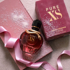 Pure XS Eau de Parfum by Paco Rabanne is a daringly seductive scent that fuses sweet and exotic notes with a bold floral heart. It’s made for the woman who owns her allure and embraces confidence in every step. This 100% authentic imported tester delivers top-tier quality and long-lasting performance without the designer price.