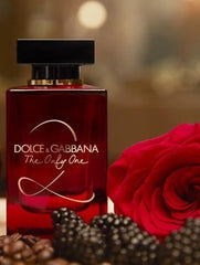 Dolce & Gabbana perfume bottle with a red rose and blackberries on a blurred backgroundThe Only One Eau de Parfum by Dolce & Gabbana is a captivating blend of vibrant fruits, rich florals, and warm, decadent vanilla. Designed for the woman who turns heads effortlessly, this luxurious scent evokes power, grace, and timeless allure. This 100% authentic imported tester delivers iconic D&G quality at unbeatable prices.