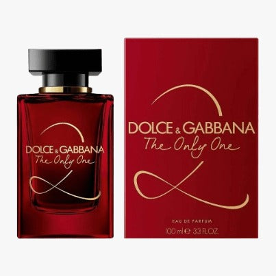 Dolce & Gabbana The Only One EDP 100ml perfume bottle and packaging, with red and gold design elements.
The Only One Eau de Parfum by Dolce & Gabbana is a captivating blend of vibrant fruits, rich florals, and warm, decadent vanilla. Designed for the woman who turns heads effortlessly, this luxurious scent evokes power, grace, and timeless allure. This 100% authentic imported tester delivers iconic D&G quality at unbeatable prices.