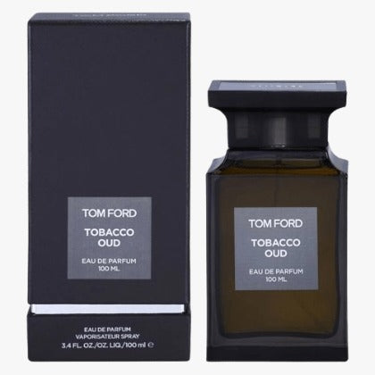 Tom Ford Tobacco Oud EDP 100ml bottle with its black box packaging, both displaying the brand name and product scent.
Tom Ford Tobacco Oud Eau de Parfum is a daring and intoxicating scent that combines the richness of tobacco with the depth of resinous oud. Bold and luxurious, it’s crafted for the confident soul who embraces opulence and intensity. This 100% authentic imported tester delivers Tom Ford’s signature prestige without the high-end retail price.