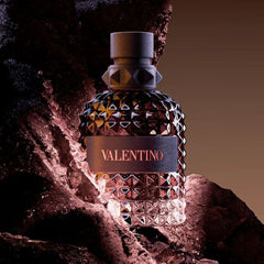 Valentino perfume bottle on a textured surface with a warm glow
Valentino Uomo Born in Roma Eau de Toilette captures the essence of modern masculinity with a vibrant burst of violet leaf, blending it with timeless elegance and a smoky, earthy finish. The sophisticated balance of aromatic sage and smoked vetiver gives it a powerful, distinctive character that lingers long after the first spray. This 100% authentic imported tester offers luxury, longevity, and projection at an unbeatable price.
