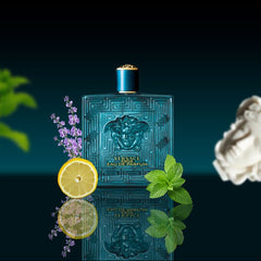 Blue Versace perfume bottle with lemon, lavender, and mint leaves on a dark background
Versace Eros Eau de Parfum is a bold expression of masculine confidence blending zesty freshness with sweetness and a woody base. Designed for the man who commands attention, this EDP offers a deeper, more intense version of the classic Eros. Our 100% authentic imported tester brings you luxury without the luxury price tag.