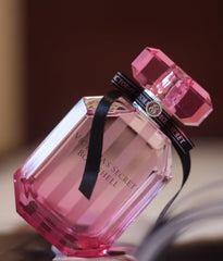 Victoria’s Secret Bombshell Eau de Parfum is a luxurious, bright, and feminine fragrance bursting with fruity and floral notes. With an invigorating blend of Passionfruit, Grapefruit, Pineapple, and Tangerine, Peony, Vanilla Orchid, Red Berries, Jasmine, and Lily-of-the-Valley, creating a rich and captivating scen, warm base of Musk, Woody Notes, and Oakmoss adds depth, leaving a lingering sensual trail.This 100% authentic imported tester offers premium quality, lasting power, and strong projection