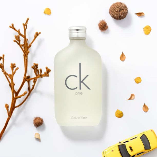 Calvin Klein CK One perfume bottle on a white background with decorative elements.
CK One Eau de Toilette by Calvin Klein is the ultimate unisex fragrance.&nbsp;A&nbsp;crisp, citrusy blend that’s modern, refreshing, and universally loved. Whether you’re headed to the office, gym, or out on the town, CK One keeps you feeling fresh, light, and energized. This 100% authentic imported tester gives you timeless Calvin Klein quality without the luxury price.