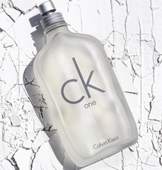 Calvin Klein CK One perfume bottle on a textured white background
CK One Eau de Toilette by Calvin Klein is the ultimate unisex fragrance.&nbsp;A&nbsp;crisp, citrusy blend that’s modern, refreshing, and universally loved. Whether you’re headed to the office, gym, or out on the town, CK One keeps you feeling fresh, light, and energized. This 100% authentic imported tester gives you timeless Calvin Klein quality without the luxury price.