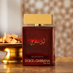 Dolce & Gabbana perfume bottle with a gold cap on a wooden surface.
Dolce &amp; Gabbana The One for Men Exclusive Edition Eau de Parfum is a luxurious, deep, and refined scent crafted for the confident and magnetic man. Rich in spices, woods, and amber, this exclusive blend evokes charm, sensuality, and strength. This 100% authentic imported tester gives you the full Dolce &amp; Gabbana experience without the premium price tag.