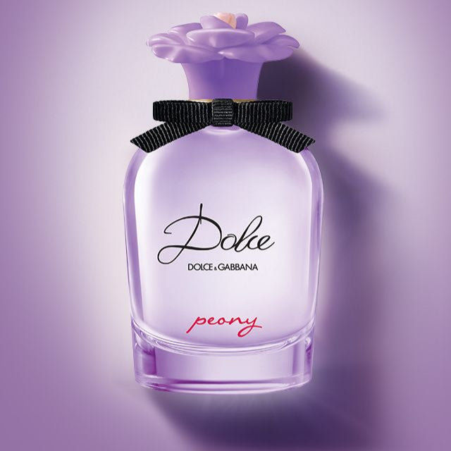Dolce & Gabbana Peony perfume bottle on a purple background
Dolce Peony Eau de Parfum by Dolce &amp; Gabbana is a radiant tribute to the elegance of spring in bloom. With delicate peony, juicy fruits, and warm musk, it captures the essence of femininity with a playful yet refined touch. This 100% authentic imported tester delivers Dolce luxury and lasting freshness without the premium price tag.