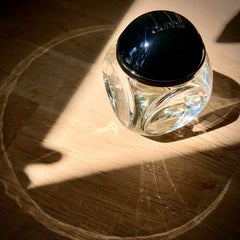 Glass jar with a black lid on a wooden surface
Dunhill London Century Eau de Parfum is a refined, modern scent crafted for the confident gentleman. A sophisticated blend of citrus, woods, and musky accords, this fragrance speaks to a man of quiet power and enduring style. This 100% authentic imported tester offers a luxury olfactory experience without the high-end price tag.