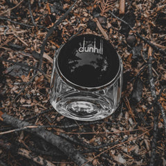 Clear glass container with black lid featuring 'dunhill' logo on a dark, leafy ground.
Dunhill London Century Eau de Parfum is a refined, modern scent crafted for the confident gentleman. A sophisticated blend of citrus, woods, and musky accords, this fragrance speaks to a man of quiet power and enduring style. This 100% authentic imported tester offers a luxury olfactory experience without the high-end price tag.