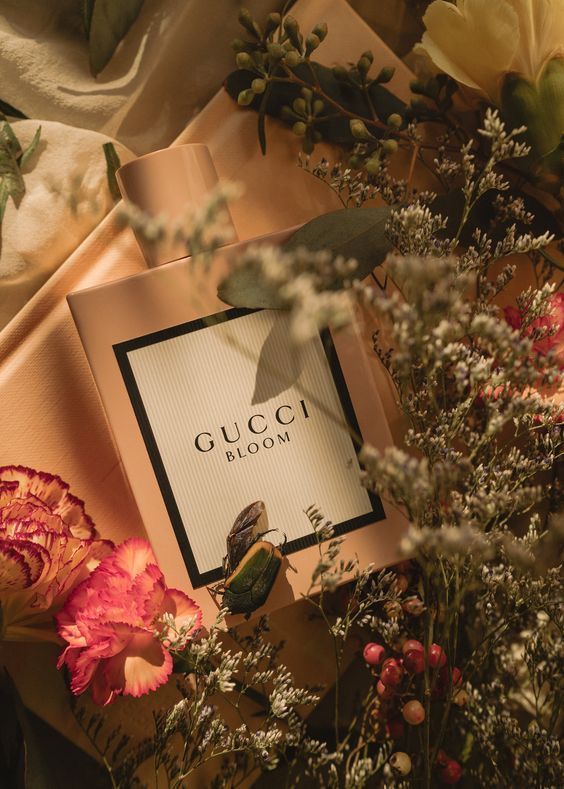 Gucci Bloom perfume box surrounded by flowers and greenery
Gucci Bloom Eau de Parfum is an enchanting celebration of white florals, created for the modern woman who flourishes in her own authenticity. Rich, radiant, and irresistibly luxurious, this 100% authentic imported tester delivers the elegance of Gucci without the designer price tag.