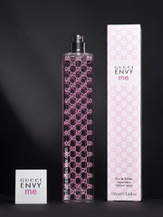 Gucci Envy me perfume bottle and packaging on a black background
Gucci Envy Me Eau de Toilette is a youthful and flirty blend of sweet fruits, delicate florals, and soft woods. Designed for the confident, modern woman who loves to stand out, this 100% authentic imported tester combines high-end quality with unbeatable value without the luxury price tag.