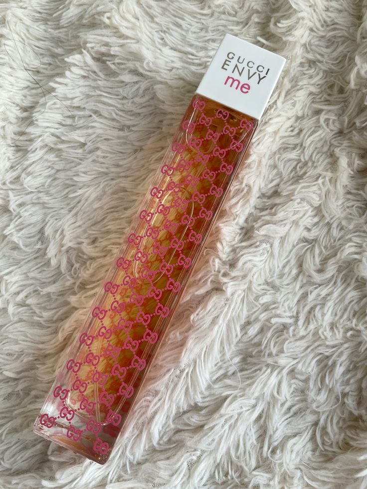 Gucci Envy me hair extensions packaging on a fluffy white surface
Gucci Envy Me Eau de Toilette is a youthful and flirty blend of sweet fruits, delicate florals, and soft woods. Designed for the confident, modern woman who loves to stand out, this 100% authentic imported tester combines high-end quality with unbeatable value without the luxury price tag.