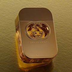 Gold Gucci perfume bottle on a matching gold background
Gucci Guilty Eau de Toilette is a bold and captivating scent designed for the modern woman who refuses to follow the rules. With a vibrant floral heart, sweet fruits, and a warm, musky base, it’s daring yet elegant. This 100% authentic imported tester offers luxury and lasting performance without the high-end retail price.