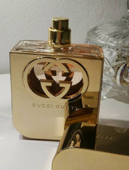 Gold Gucci perfume bottle on a white surface. Gucci Guilty Eau de Toilette is a bold and captivating scent designed for the modern woman who refuses to follow the rules. With a vibrant floral heart, sweet fruits, and a warm, musky base, it’s daring yet elegant. This 100% authentic imported tester offers luxury and lasting performance without the high-end retail price.