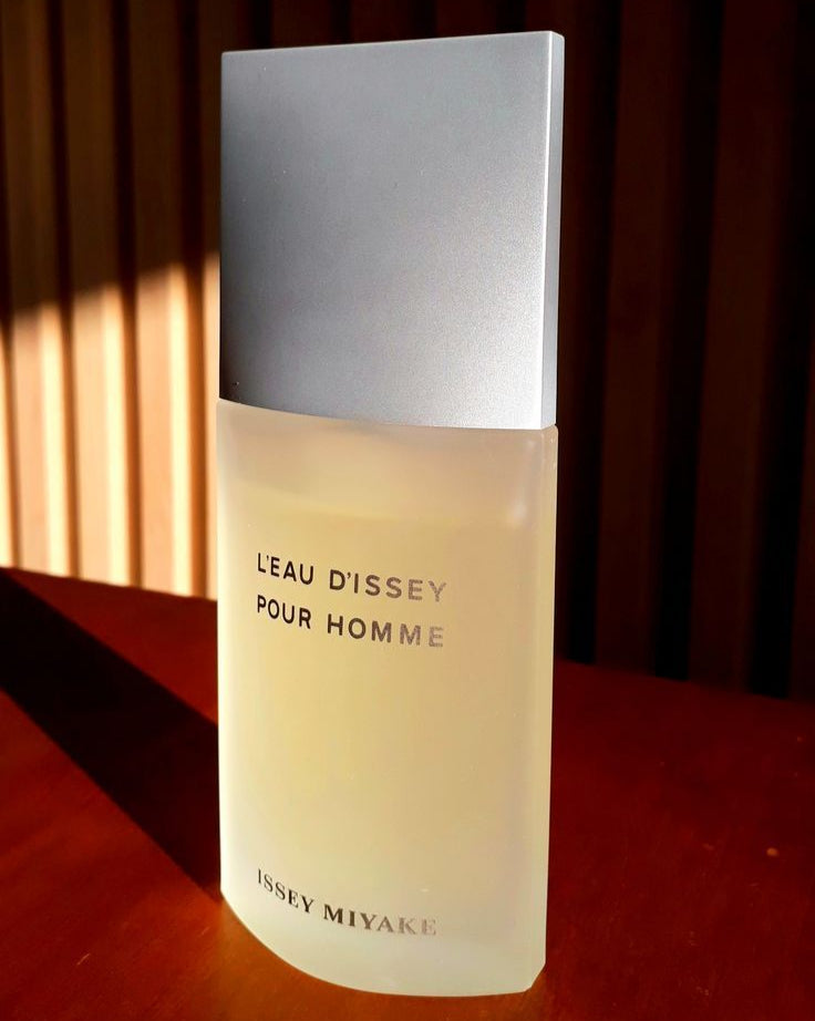 Perfume bottle labeled 'Leau Dissey Pour Homme' by Issey Miyake on a wooden surface.
L’Eau D’Issey Pour Homme by Issey Miyake is a refined, refreshing scent for men who appreciate balance and elegance. Inspired by water's clarity and power, this 100% authentic imported tester offers a crisp, woody-aquatic blend perfect for everyday wear. A masterclass in minimalism, it combines bold citrus, spicy warmth, and smooth woody notes all without the luxury markup.