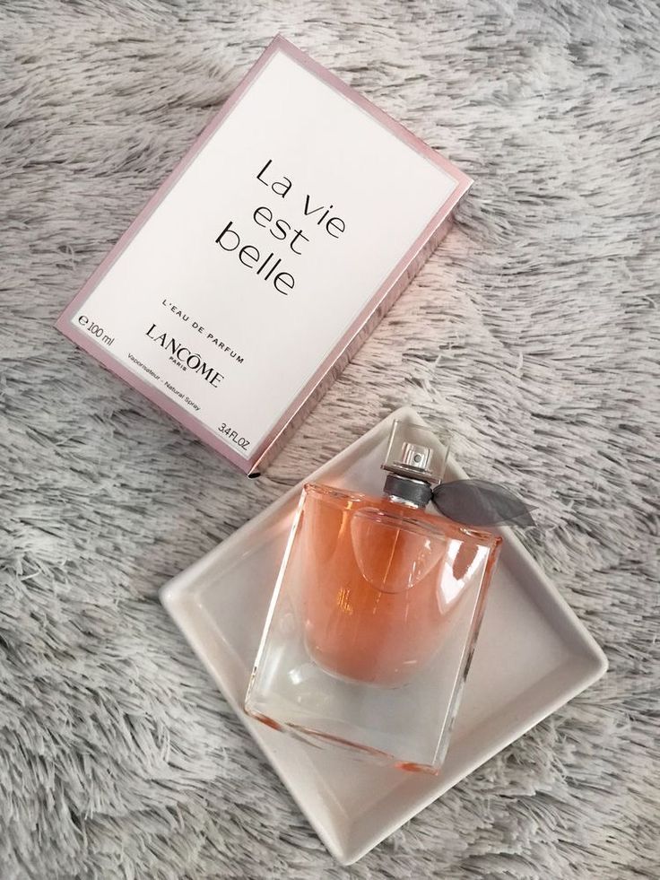 Lancome 'La Vie Est Belle' perfume bottle and packaging on a textured surface
La Vie Est Belle Eau de Parfum by Lancôme is a timeless expression of joyful femininity, crafted with a blend of luxurious florals, sweet fruits, and warm gourmand notes. Designed for the confident and radiant woman, this 100% authentic imported tester delivers long-lasting elegance and charm without the designer price tag.
