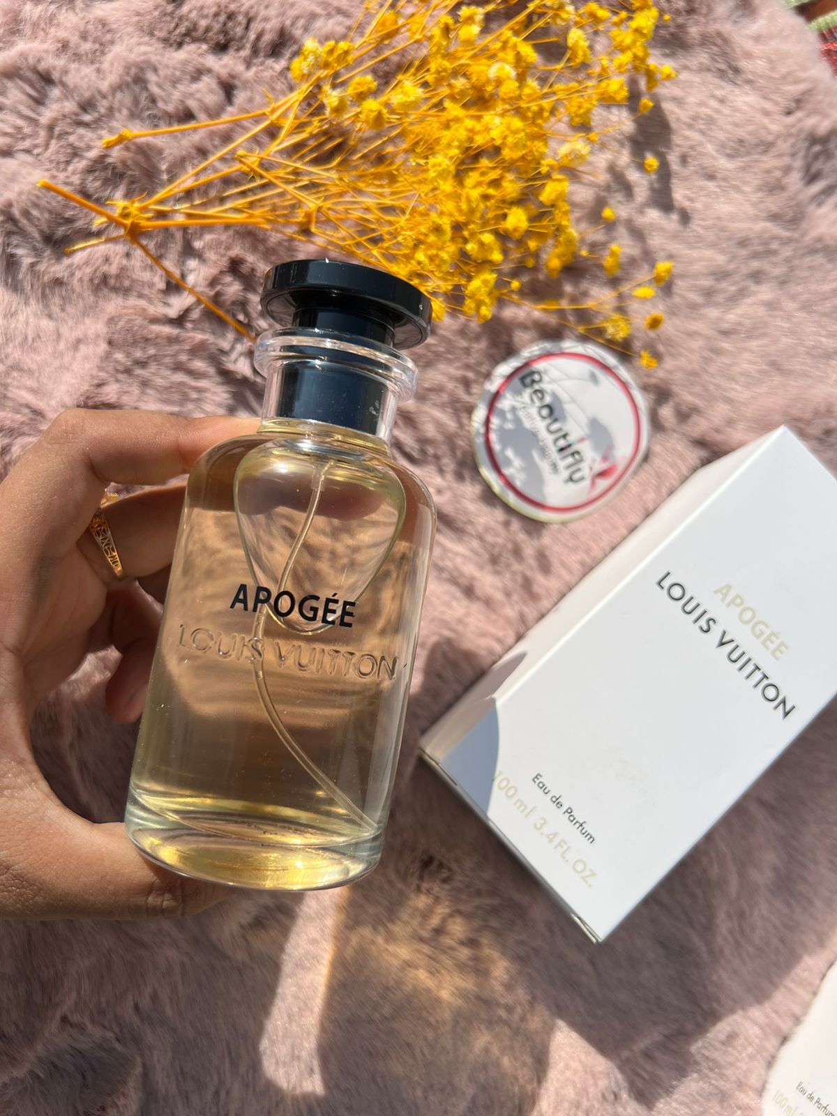 Louis Vuitton Apogée Eau de Parfum is a graceful and luminous scent that captures the essence of blooming florals in springtime. With fresh citrus top notes of Tangerine and Orange, a floral heart of Lily-of-the-Valley, Magnolia, Rose, and Jasmine, base of White Musk, Guaiac Wood, and Sandalwood—this perfume embodies effortless sophistication and charm. This 100% authentic, imported tester offers luxurious quality, strong performance, and captivating beauty without the premium price tag.