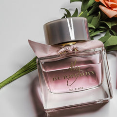 Burberry perfume bottle with pink cap and ribbon on a light background
My Burberry Blush Eau de Parfum is a lively and uplifting blend of fruity freshness and delicate florals, inspired by a London garden in the early morning light. Bright and radiant, it’s designed for the woman who radiates optimism and grace. This 100% authentic imported tester brings Burberry’s signature sophistication at an unbeatable value.