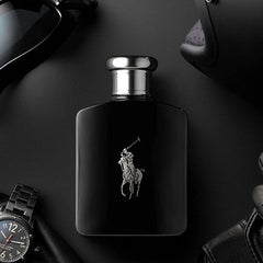 Black Ralph Lauren perfume bottle with sunglasses and a watch on a dark surface
Polo Black Eau de Toilette by Ralph Lauren is a daring blend of vibrant citrus, icy mango, and deep woody accords. Crafted for the contemporary man who embraces life with style and swagger, this fragrance offers both freshness and strength in one sleek bottle. Experience luxury, power, and performance & without the luxury price tag with our 100% authentic imported tester.