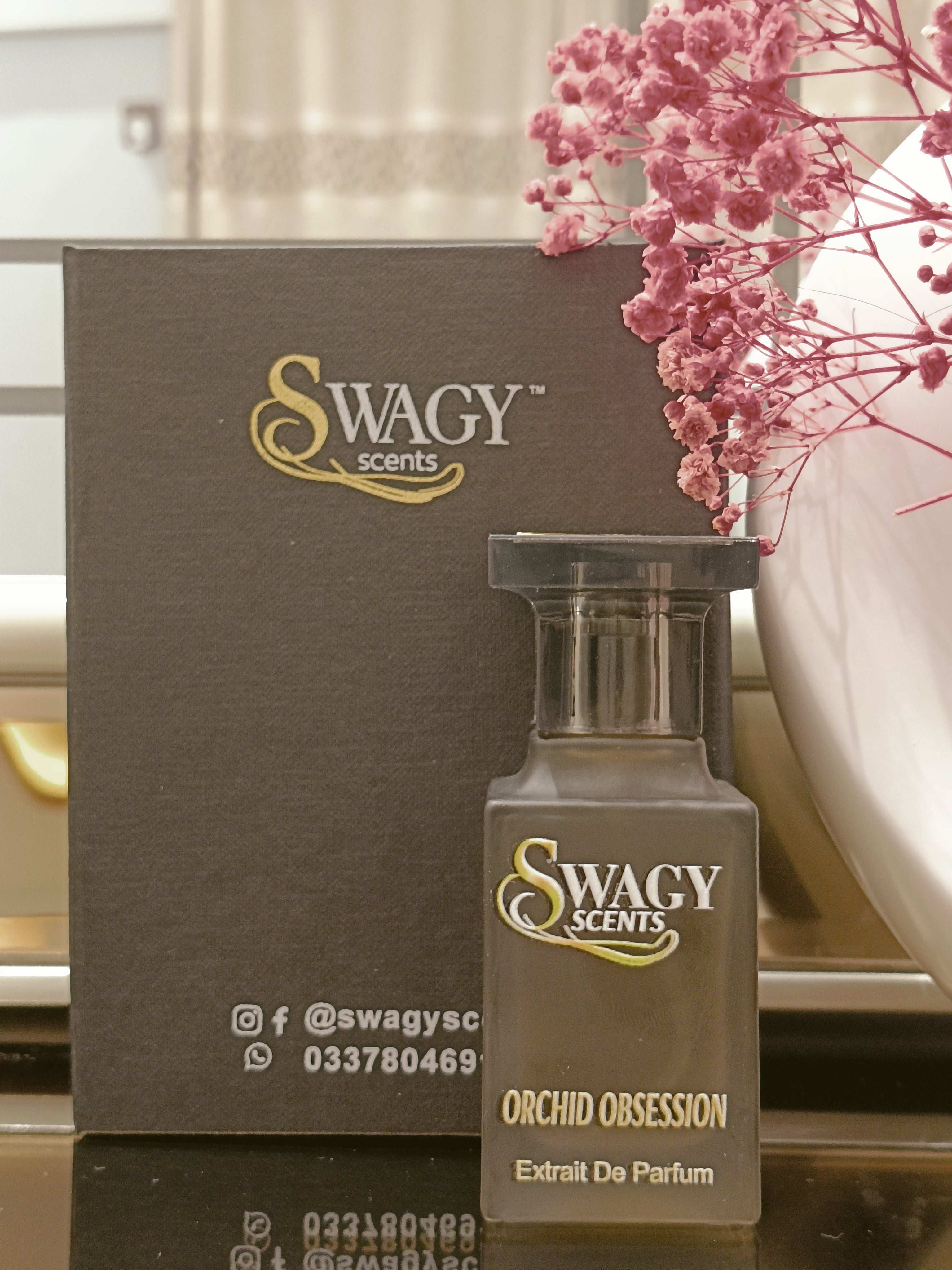 Orchid Obsession Eau de Parfum by Swagy Scents is an alluring blend of exotic orchids, rich florals, and creamy vanilla, elevated with vibrant fruits and warm spices. Feminine yet bold, this 100% authentic imported tester is crafted for those who crave sophistication with a hint of mystery.
