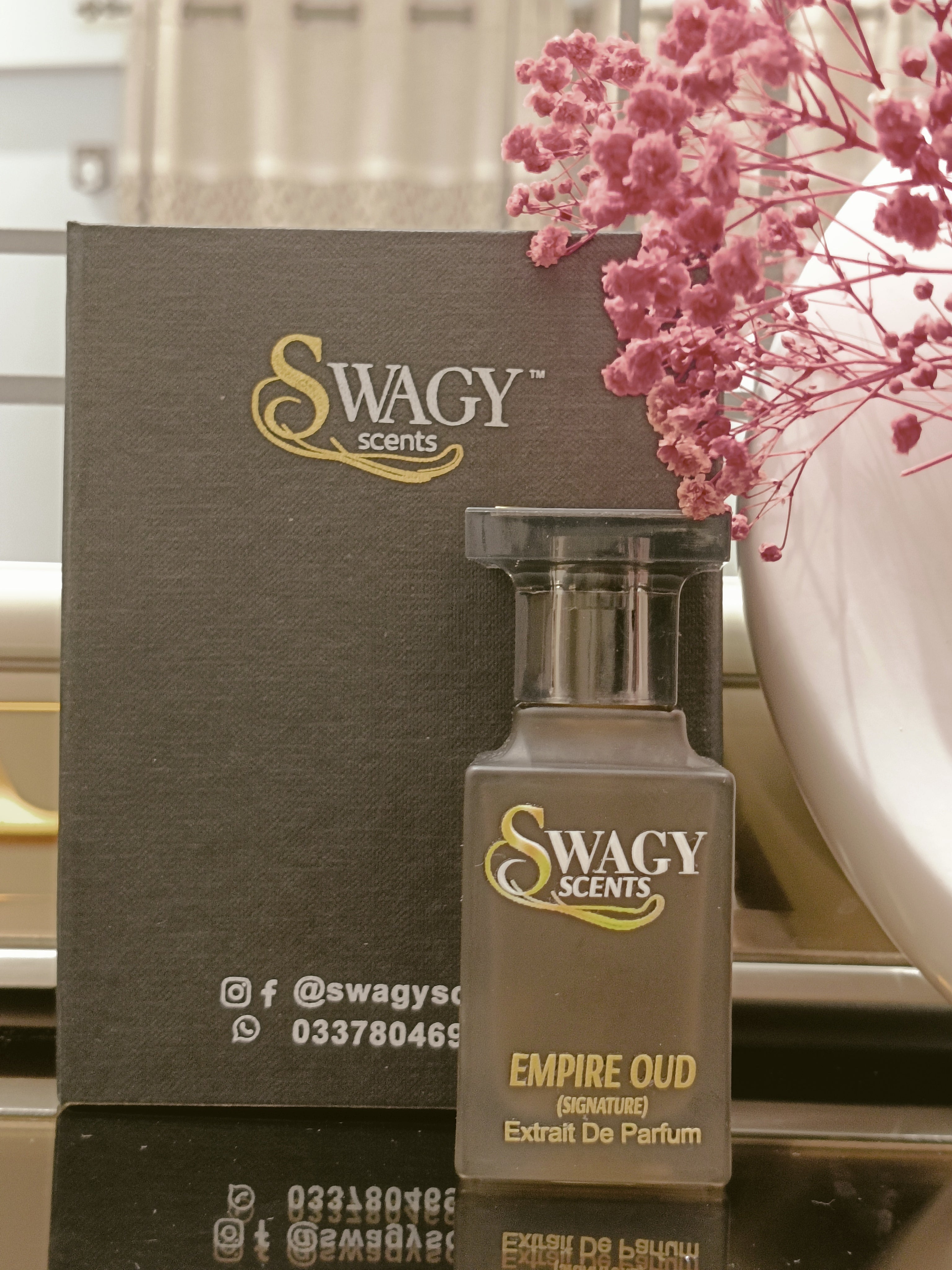 Empire Oud Eau de Parfum by Swagy Scents is a masterful blend of luxurious oud, rich amber, and smooth vanilla,&nbsp;all infused with smoky woods, spices, and florals. Deep, sensual, and unforgettable, this 100% authentic imported tester is designed for those who command attention and leave a lasting impression.