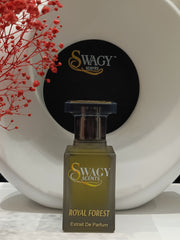 Swagy Scents Royal Forest Eau de Parfum is a captivating blend of vibrant fruits, spicy greens, and deep woods. Inspired by nature’s untamed elegance, it’s crafted for the modern man who commands presence with ease. This 100% authentic imported tester combines standout performance with unbeatable value.